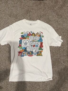 Disney White Walt Disney World Graphic Tee with concert style back list